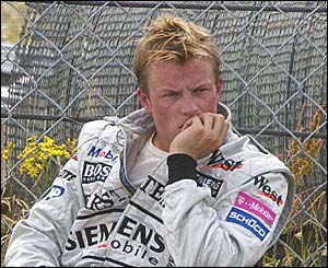 Kimi Raikkonen watches the race after retiring at the Nurburgring