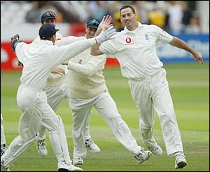 England's Martin Bicknell celebrates taking the wicket of Herschelle Gibbs 