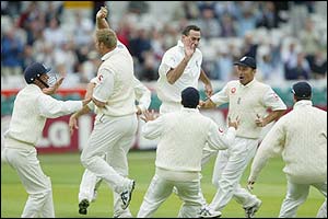 England's players celebrate the dismissal of Herschelle Gibbs