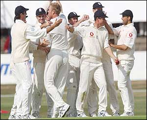 Flintoff is congratulated after dismissing Andrew Hall straight after tea