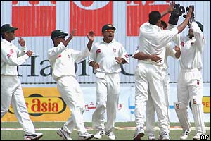 Bangladesh players celebrate the dismissal of Pakistan opener Muhammad Hafeez