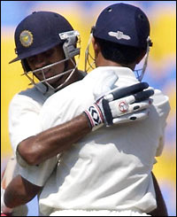 India's Rahul Dravid (left) is congratulated by captain Sourav Ganguly 