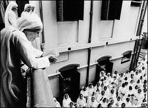Mother Teresa stands at the balcony of her residence