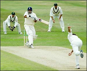 England's Mark Butcher pulls the ball for four