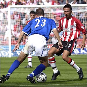 Jamie Clapham and Fabrice Fernandes do battle at St Mary's