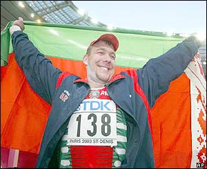 Mikhnevich celebrates his gold medal in the shot putt