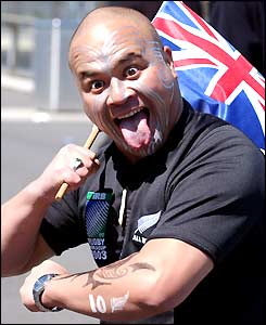 A New Zealand fan gets excited before the game