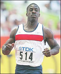 Great Britain's Dwain Chambers runs in the 100m quarter-finals