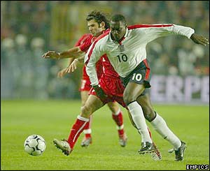 England's Emile Heskey gets the better of Turkey's Bulent
