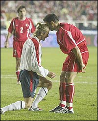 Beckham clashes heads with Turkey's Alpay
