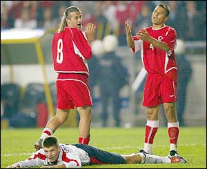 Steven Gerrard is fouled to earn England a penalty