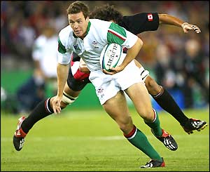 Mark Jones breaks free of a Canadian challenge