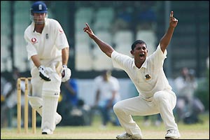 England's Michael Vaughan survives and lbw appeal