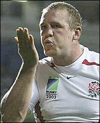 Mike Tindall celebrates as he scores England's first try 