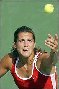 France's Amelie Mauresmo prepares to serve