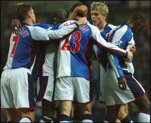 Blackburn players celebrate equalising against Manchester City