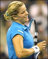 Kim Clijsters smiles after beating Amber Liu of the USA in round one