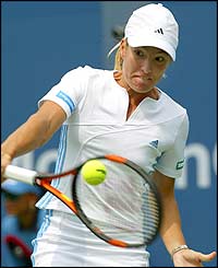 Second seed Justine Henin-Hardenne in action against Aniko Kapros