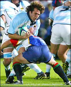 Pablo Bouza is tackled by a Namibian forward