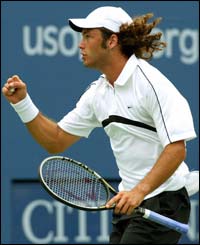 Argentina's Jose Acasuso celebrates a winning shot