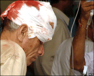 A man injured in a stampede is treated for head injuries