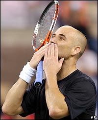 Andre Agassi plays to the crowd at Flushing Meadows