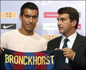 Giovanni van Bronckhorst joins Barcelona on a season-long loan