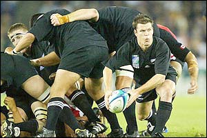 Scrum-half Steve Devine spins a pass from a ruck