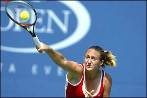 Mary Pierce blasts a smash past Japan's Shinobu Asagoe
