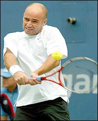 Andre Agassi plays a powerful forehand 