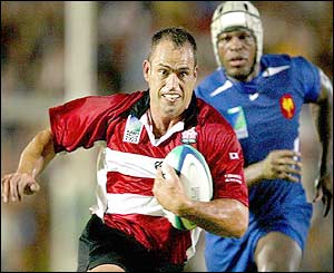 George Konia scores a try for Japan