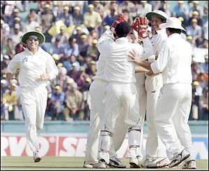 New Zealand celebrate the wicket of Rahul Dravid