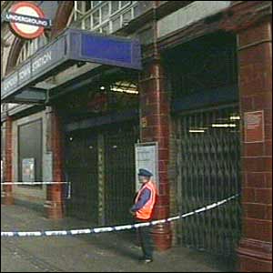 Member of staff outside the closed station