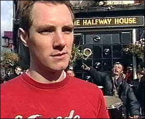 Eyewitness Harry Anscombe talking to reporters outside the nearby Halfway House pub