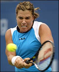 Jennifer Capriati returns to Elena Dementieva of Russia