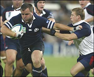 Tom Smith drives forward for Scotland