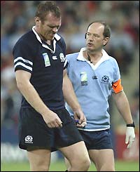 Scotland flanker Jon Petrie leaves the field with an injured shoulder on 53 minutes