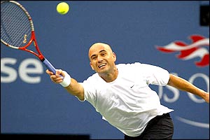 Andre Agassi stretches to return a shot from fellow American Taylor Dent