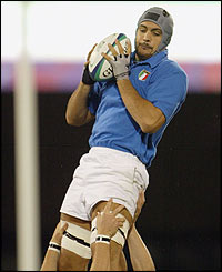 Italy's Marco Bortolami gathers the ball at a line-out during the first half