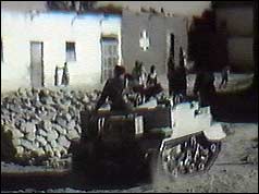 British troops in an armoured car