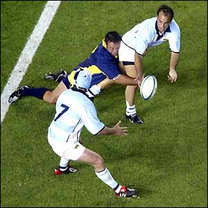 Juan Fernandez Miranda offloads the ball during an Argentina attack