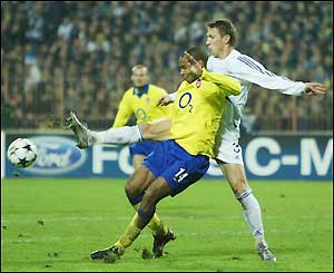 Thierry Henry battles with Kiev's Sergiy Fedorov