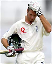 England captain Michael Vaughan makes his from the crease after being dismissed
