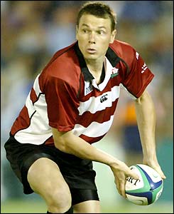 New Zealand born fly-half Andrew Miller prepares to pass 
