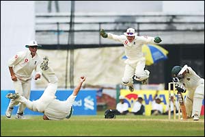 Nasser Hussain dives and takes a brilliant bat-pad catch to dismiss Khaled Mashud