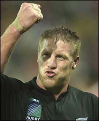Brad Thorn of New Zealand punches the air to celebrate beating Tonga