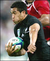 Mils Muliaina runs towards the try-line