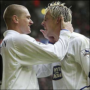 Alan Smith (right) celebrates with Seth Johnson after he scores his 50th goal for Leeds