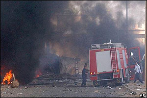 Fire engine rushes to scene of blast as flames erupt outside of ICRC building in Baghdad