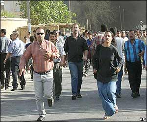 People run from scene of blast in Baghdad